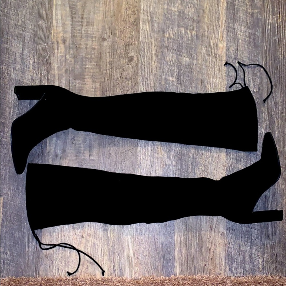 Stuart Weitzman High Champ Boots.